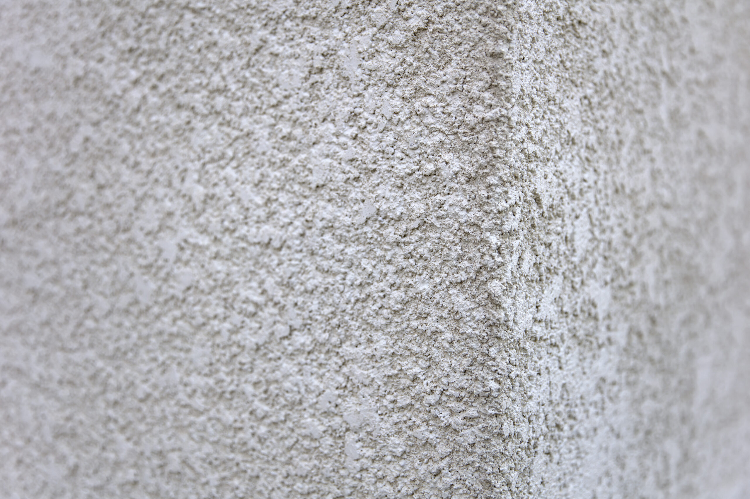 Detail of the old white concrete wall backdrop